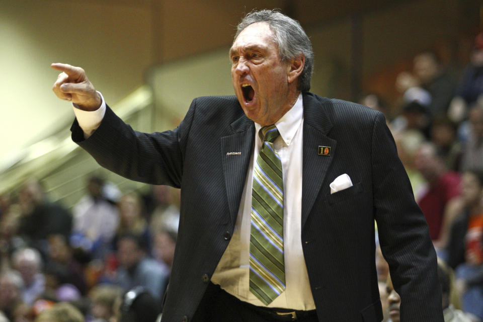 FILE - In this Saturday, Feb. 2, 2008, file photo, San Francisco head coach Eddie Sutton coaches against Pepperdine during the second half of an NCAA college basketball game in Malibu, Calif. USF won 88-85 to give Sutton his 800th win. Sutton, the Hall of Fame basketball coach who led three teams to the Final Four and was the first coach to take four schools to the NCAA Tournament, died Saturday, May 23, 2020. He was 84. (AP Photo/Jeff Lewis, File)