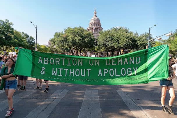 PHOTO: Abortion rights demonstrators march near the State Capitol in Austin, Texas, June 25, 2022.  (Suzanne Cordeiro/AFP via Getty Images)