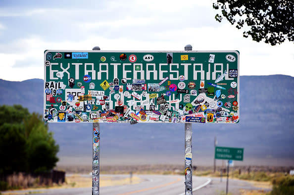An Extraterrestrial Highway sign covered with stickers is seen along state route 375 near Rachel, Nevada on July 22, 2019. | David Becker—Getty Images