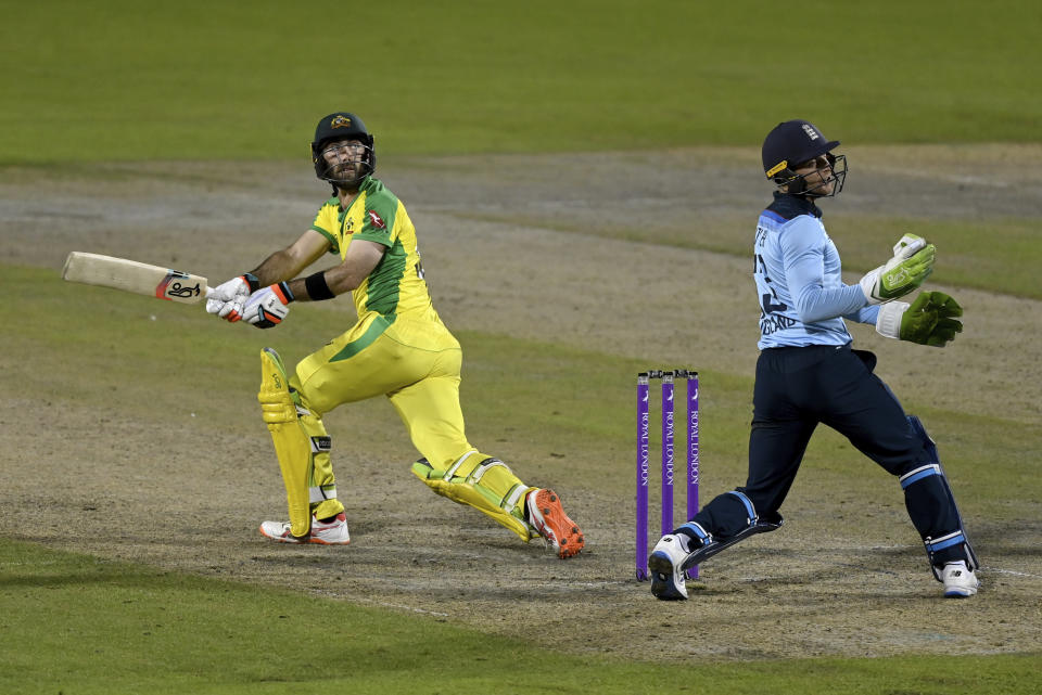 Australia's Glenn Maxwell, left, bats during the third ODI cricket match between England and Australia, at Old Trafford in Manchester, England, Wednesday, Sept. 16, 2020. (Shaun Botterill/Pool via AP)