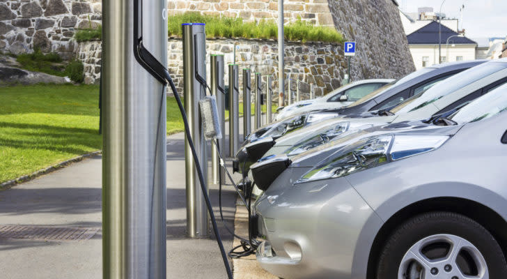 electric vehicle stocks electric vehicles at a recharging station