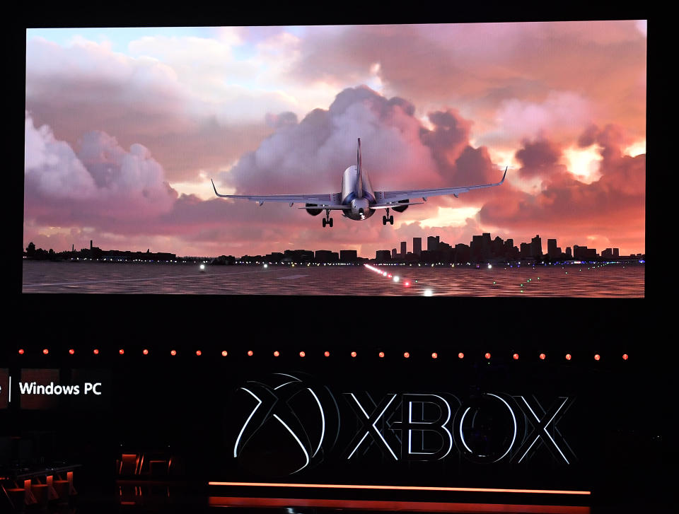 (FILES) In this file photo taken on June 09, 2019 The video game "Microsoft: Flight Simulator" is promoted at the Microsoft Xbox press event ahead of the E3 gaming convention in Los Angeles on June 9, 2019. Many aircraft are still grounded due to the coronavirus pandemic. But would-be and real pilots will soon be able to travel anywhere in the world -- virtually -- thanks to the first update in years of Microsoft's Flight Simulator game. (Photo by Mark RALSTON / AFP)