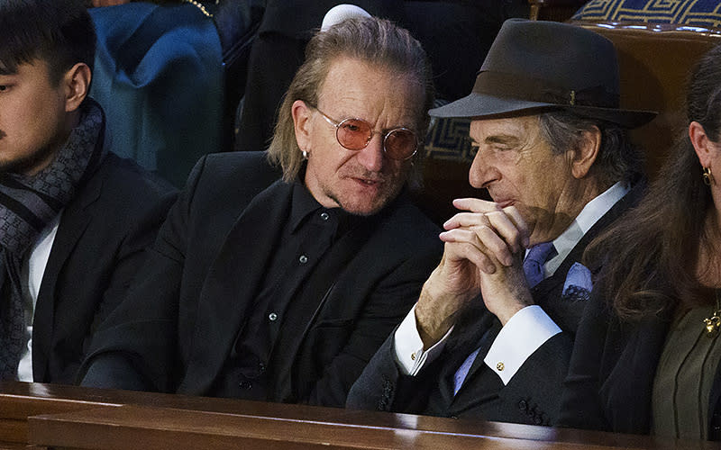 Bono and Paul Pelosi are seen prior to President Biden giving his State of the Union address during a joint session of Congress on Feb. 7. <em>Greg Nash</em>