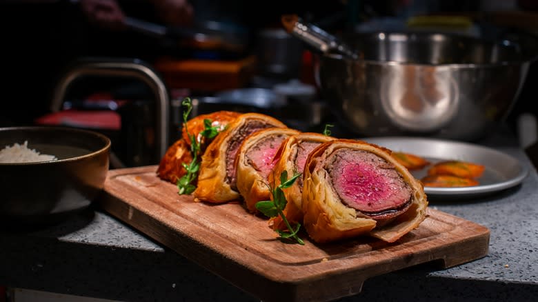 Beef Wellington resting on counter