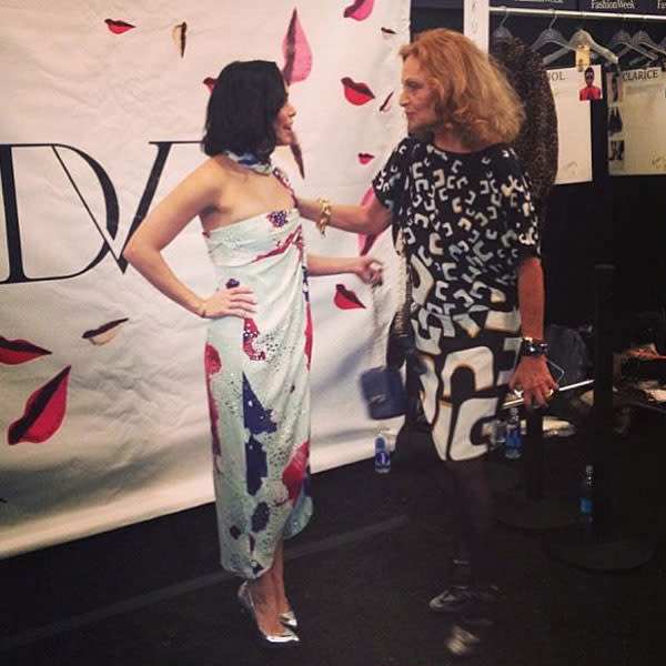 Vanessa Hudgens shared a snap of her backstage with Diane Von Furtstenberg on Twitter.