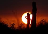 The Wider Image: When raiders menace in northern Kenya, grab your guns