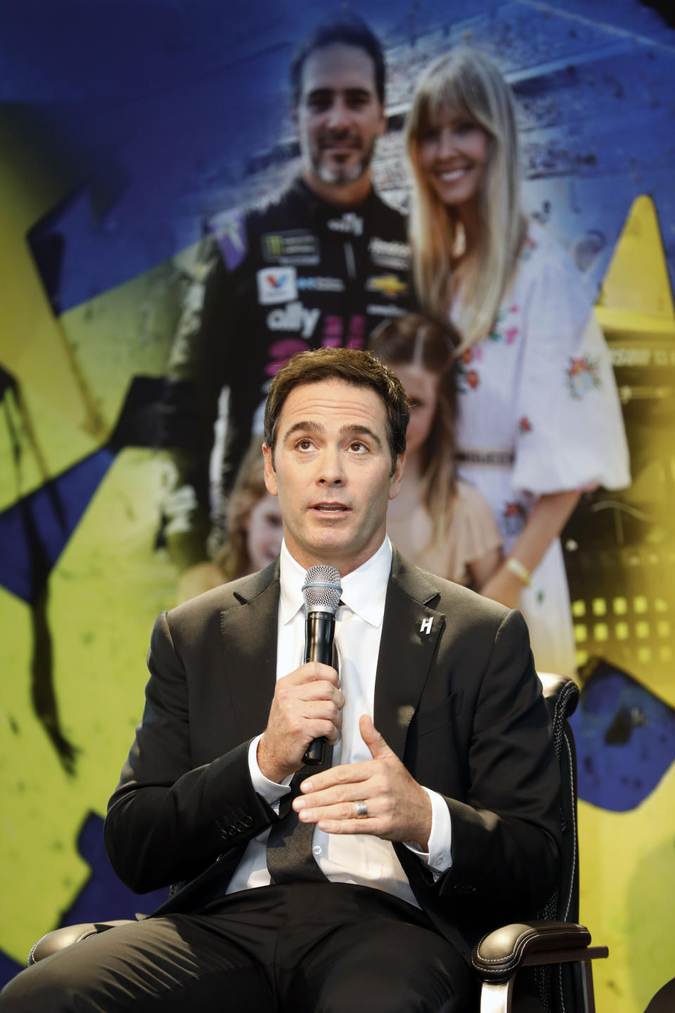 NASCAR driver Jimmie Johnson pauses during his retirement from driving announcement at Hendrick Motorsports near Charlotte, N.C., Thursday, Nov. 21, 2019. (AP Photo/Bob Leverone)