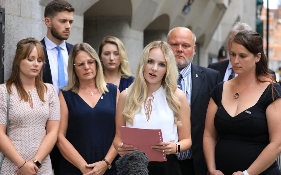 Lissie Harper (centre), the widow of Pc Andrew Harper, speaks to the media outside the Old Bailey in London - PA