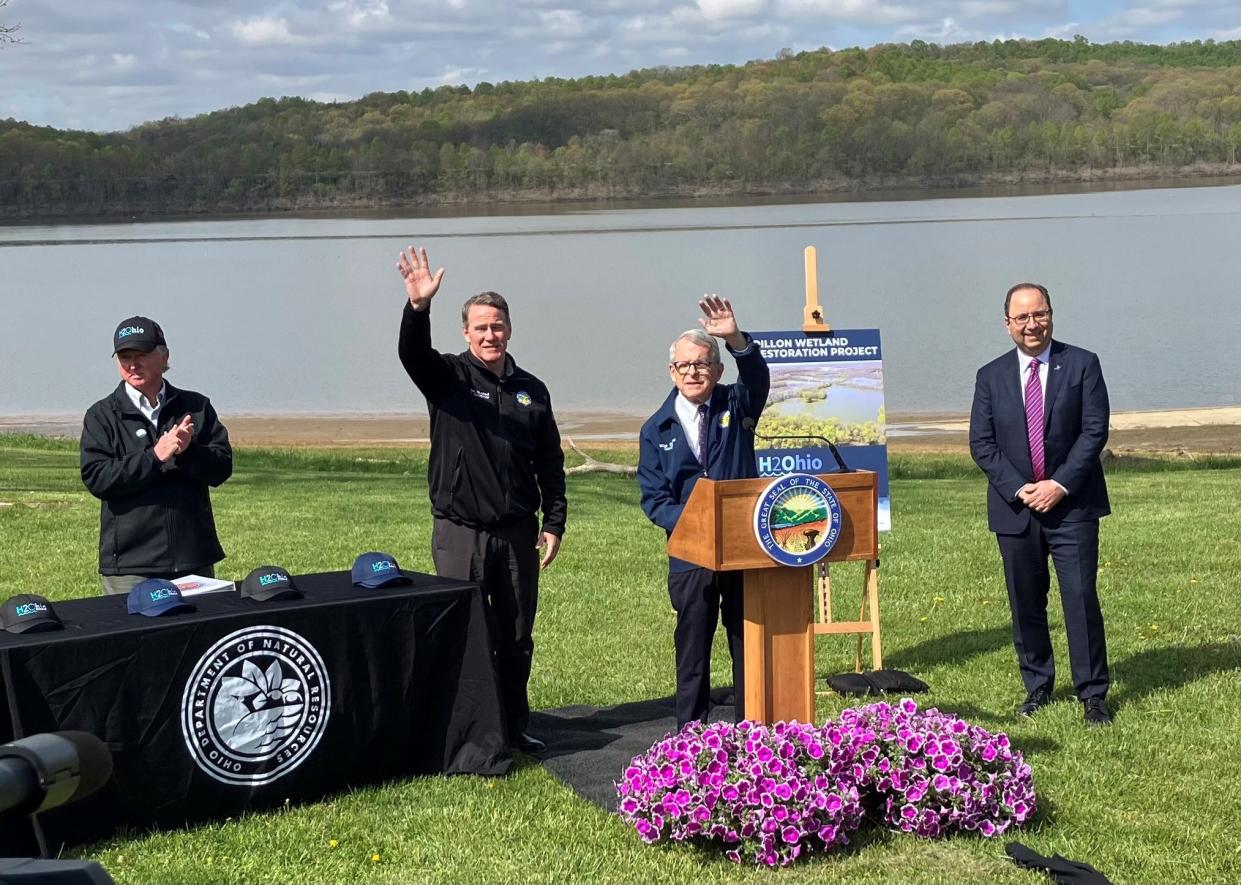 Ohio Department of Natural Resources Assistant Director Steve Gray, from left, Lt. Gov. John Husted, Gov. Mike DeWine and Intel Executive Vice President Keyvan Esfarjani welcome local officials Thursday for a wetlands project announcement at Dillon State Park.