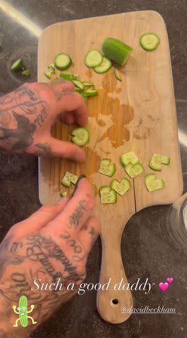 <p>Victoria Beckham Instagram</p> David Beckham cutting cucumbers for Harper