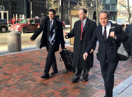 FILE PHOTO: Former Georgeson LLC employee Michael Sedlak, (center), and defense attorney David Spears (R) enter the federal courthouse in Boston, Massachusetts, U.S., February 26, 2018. REUTERS/Nate Raymond/File Photo