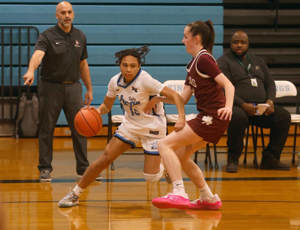 Bishop Kearney’s Asia Wilson drives the baseline against Aquinas’s Molly O’Toole.