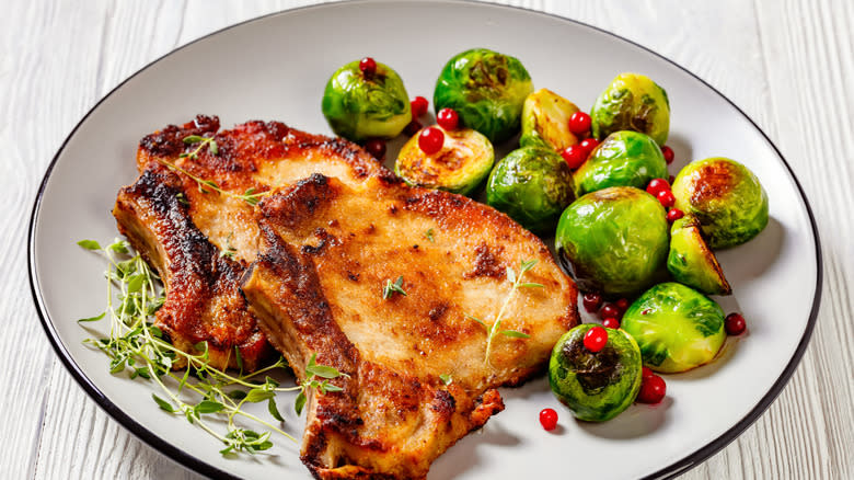 Pork chops and greens on plate