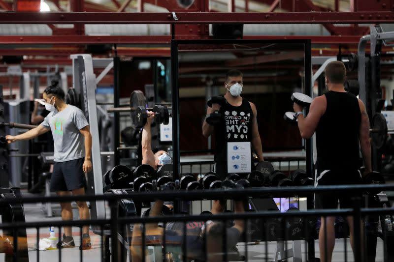 Members exercise at Chelsea Piers Fitness, Manhattan's largest fitness facility on first day of re-opening of gyms in New York