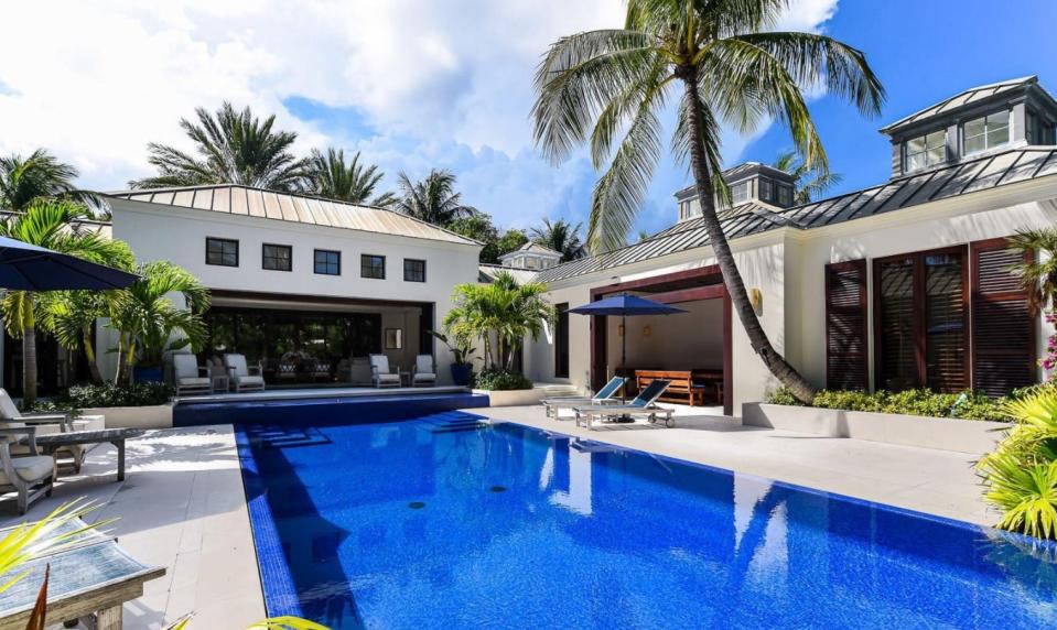 Doors from several rooms open onto the pool area at 309 Garden Road, depicted here as it looked in 2020 when Jimmy and Jane Buffett sold the house on the North End of Palm Beach for a recorded $6.9 million.