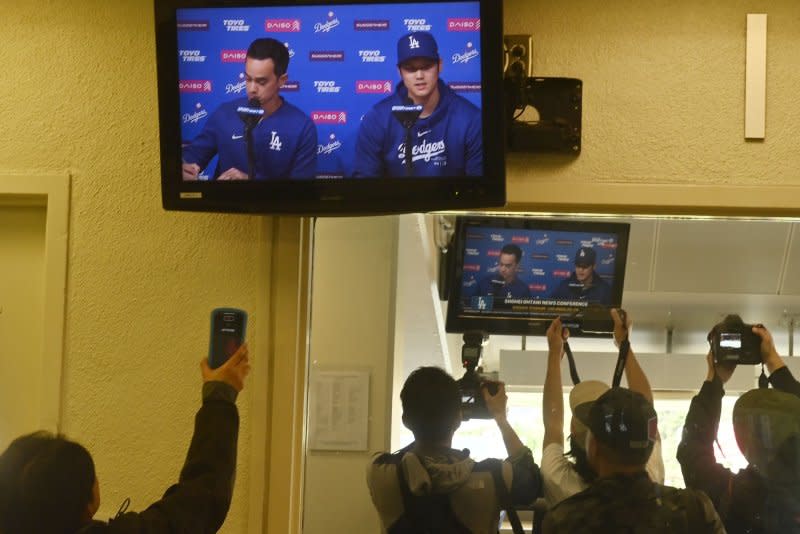 The Los Angeles Dodgers' Shohei Ohtani delivers a statement during a closed press conference as seen on a TV in the press box at Dodger Stadium on Monday. Ohtani denied ever betting on baseball or other sports in his first public comments since a scandal involving his long-time interpreter erupted last week. Photo by Jim Ruymen/UPI