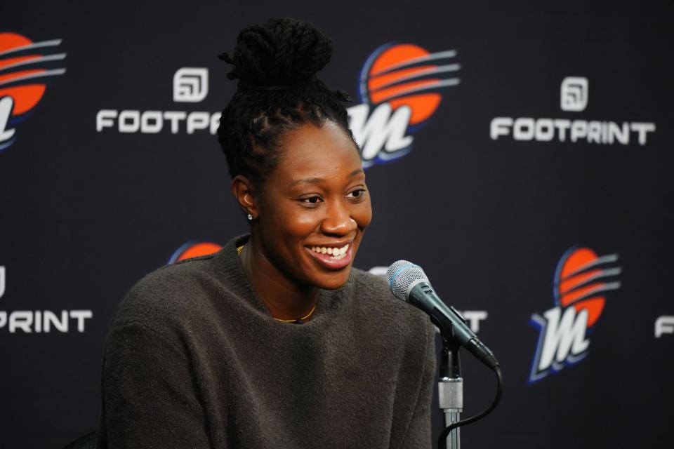 Tina Charles speaks at an introductory press conference in Phoenix on Feb. 10, 2022.