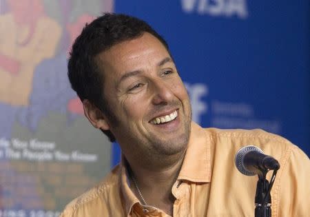 Actor Adam Sandler attends a news conference to promote the film "Men, Women & Children" at TIFF the Toronto International Film Festival in Toronto September 6, 2014. REUTERS/Fred Thornhill