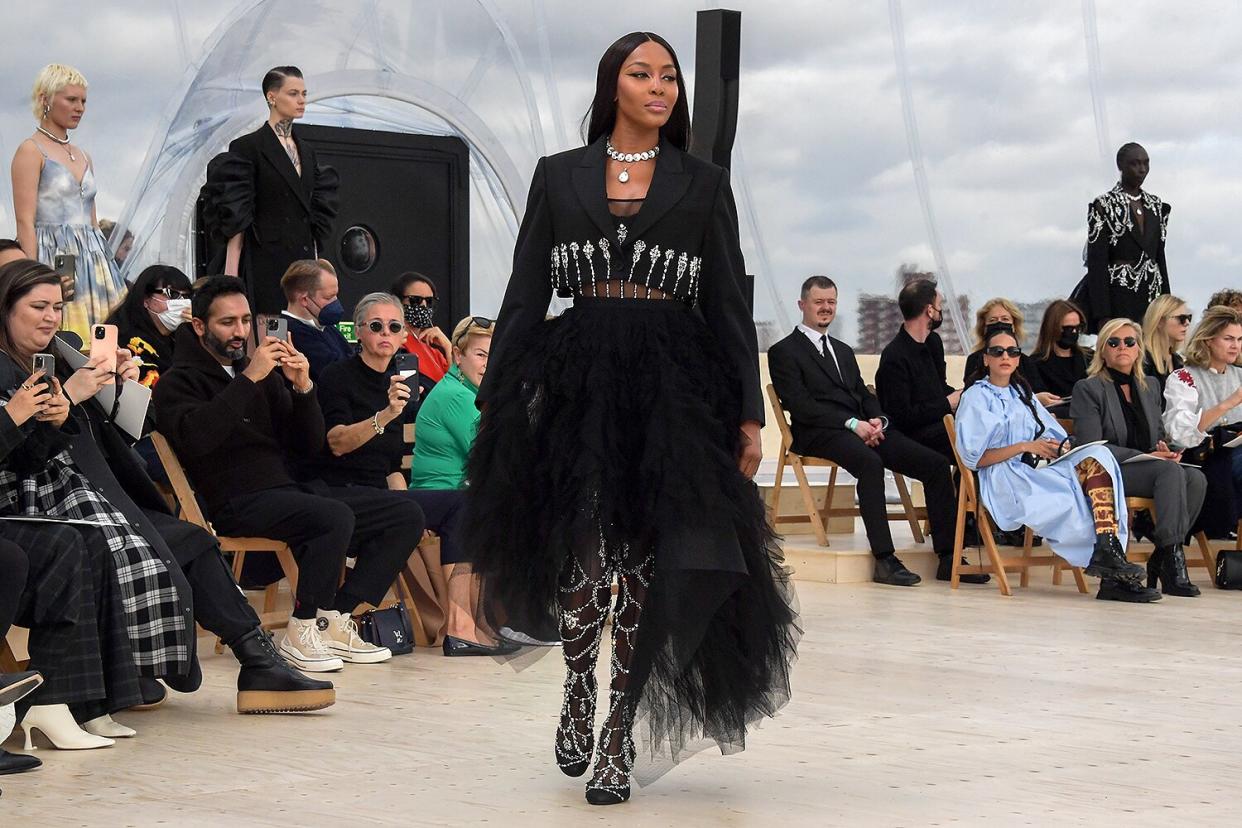 Naomi Campbell walks the runway at the Alexander McQueen SS22 Womenswear show at Tobacco Dock on October 12, 2021