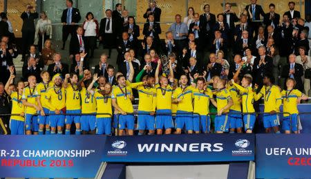 Football - Portugal v Sweden - UEFA European Under 21 Championship - Czech Republic 2015 - Final - Eden Arena, Prague, Czech Republic - 30/6/15 Sweden's Oscar Hiljemark and team mates celebrate winning the final with the trophy Action Images via Reuters / Lee Smith Livepic