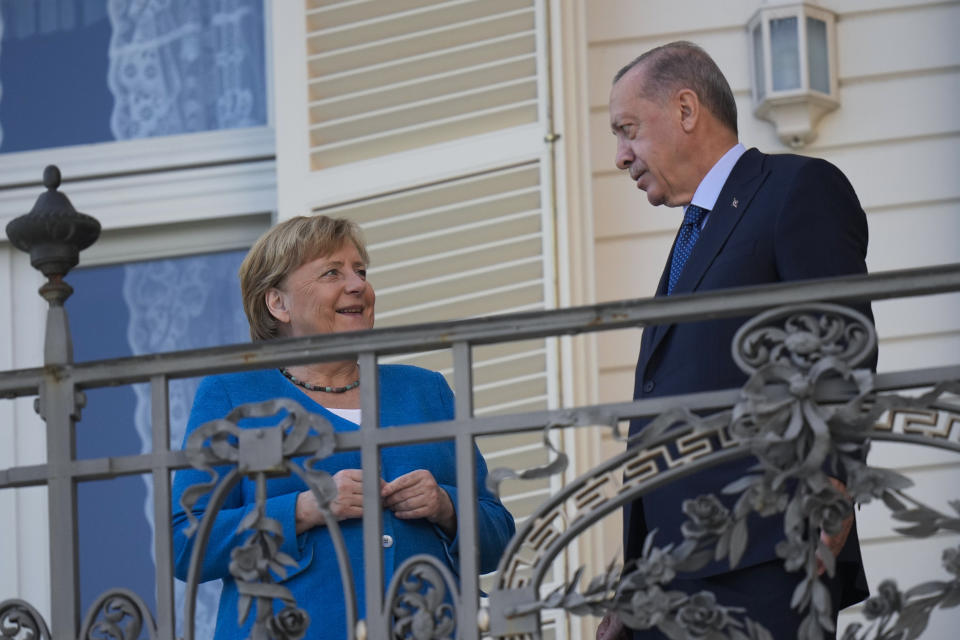 Turkey's President Recep Tayyip Erdogan, right, talks to German Chancellor Angela Merkel during their meeting at Huber Villa presidential palace, in Istanbul, Turkey, Saturday, Oct. 16, 2021. The leaders discussed Ankara's relationship with Germany and the European Union as well as regional issues including Syria and Afghanistan. (AP Photo/Francisco Seco)