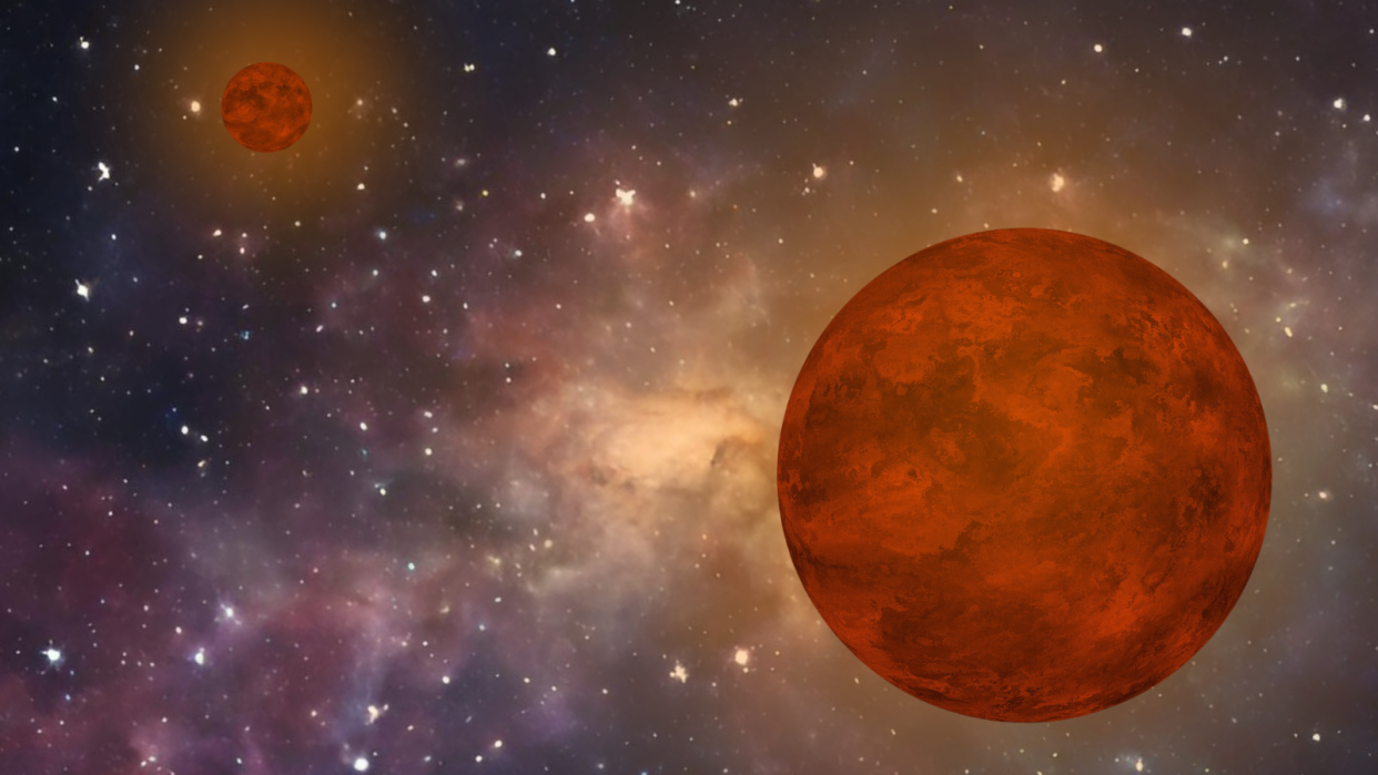  An illustration shows two brown dwarf failed stars as they part ways. 