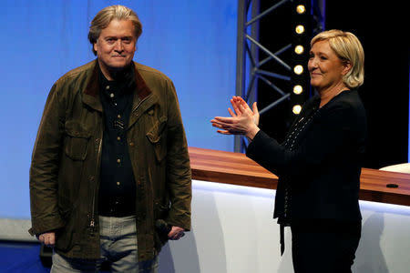 Marine Le Pen, National Front (FN) political party leader, and Former White House Chief Strategist Steve Bannon attend the party's convention in Lille, France, March 10, 2018. REUTERS/Pascal Rossignol