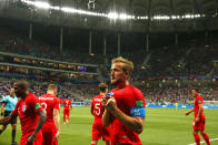 <p>The man of the hour grabs the Three Lions badge </p>