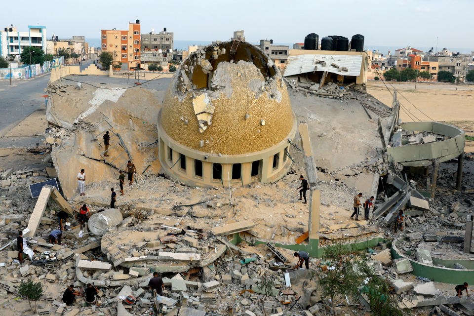 Palestinians inspect a mosque destroyed in Israeli strikes in the southern Gaza Strip on Sunday.