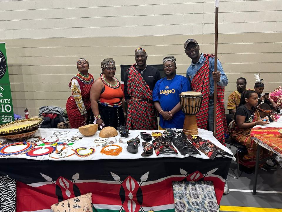 Members of Calgary's Kenyan community share beads, drums and traditional clothing at the Sharing Knowledge community event. 