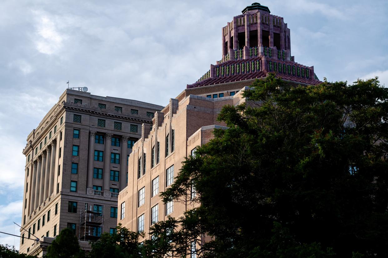 The Buncombe County Courthouse, left, and Asheville City Hall, June 20, 2024.