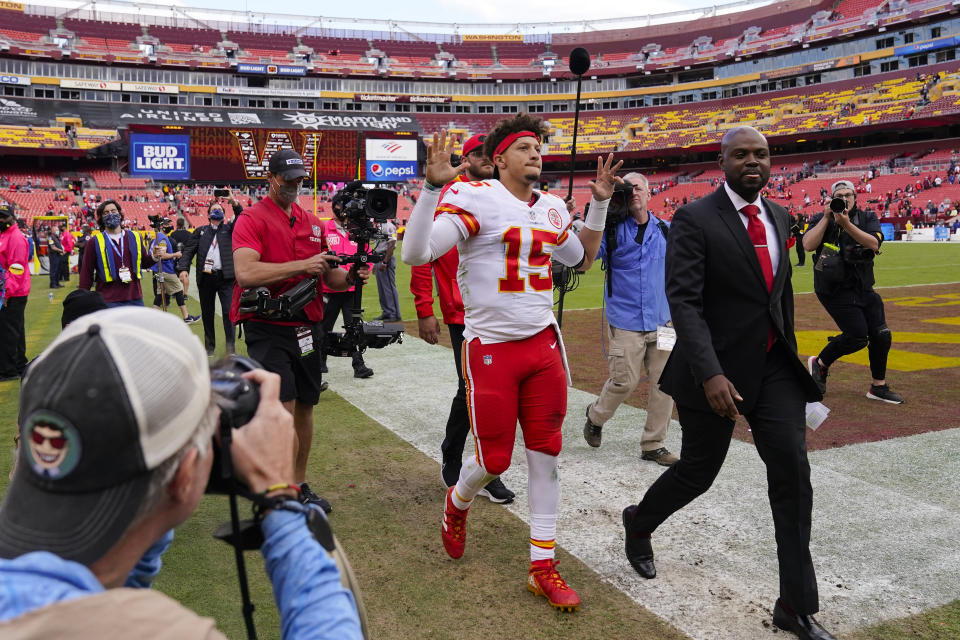 Kansas City Chiefs quarterback Patrick Mahomes (15) gestures to fans as he walks off the field at the end of an NFL football game against the Washington Football Team, Sunday, Oct. 17, 2021, in Landover, Md. Chiefs won 31-13. (AP Photo/Alex Brandon)