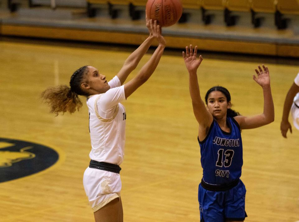 Topeka High sophomore Ladaysha Baird shoots the ball against Junction City earlier this year.