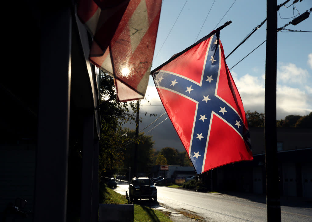 A confederate flag hangs outside a home. (Photo: Getty Images)