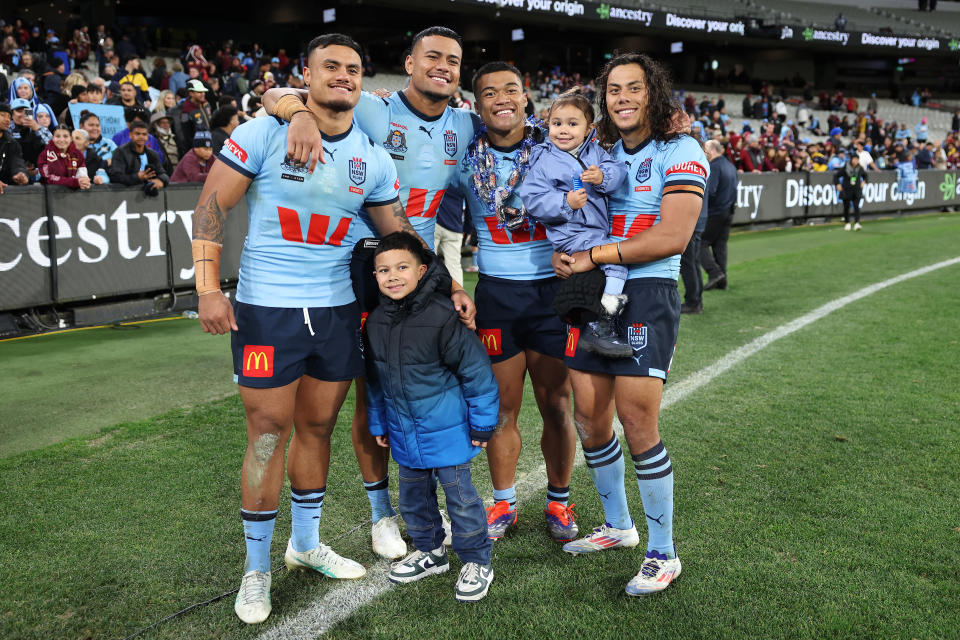 MELBOURNE, AUSTRALIA - JUNE 26:  (L-R) Spencer Leniu, Stephen Crichton, Brian To'o and Jarome Luai of the Blues pose for a photo after winning game two of the men's State of Origin series between New South Wales Blues and Queensland Maroons at the Melbourne Cricket Ground on June 26, 2024 in Melbourne, Australia. (Photo by Cameron Spencer/Getty Images)