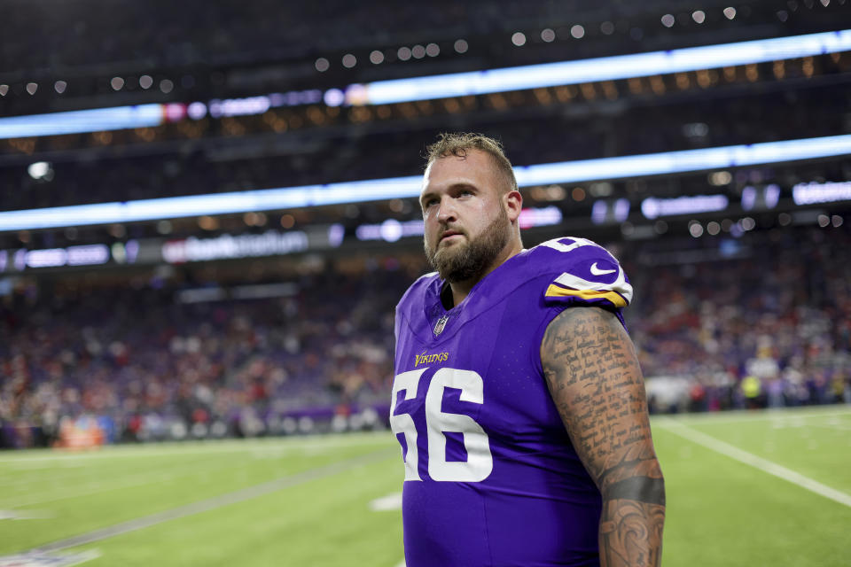 FILE - Minnesota Vikings guard Dalton Risner (66) is shown during warm ups before an NFL football game against the San Francisco 49ers, Monday, Oct. 23, 2023 in Minneapolis. The intensity of NFL fandom that increased with the surge of fantasy football has spiked further in the age of online betting. The accessibility of social media has put players in position to feel that ferocity like never before. That’s one reason why the league has a wellness program for these uniquely high-profile employees. (AP Photo/Stacy Bengs, File)