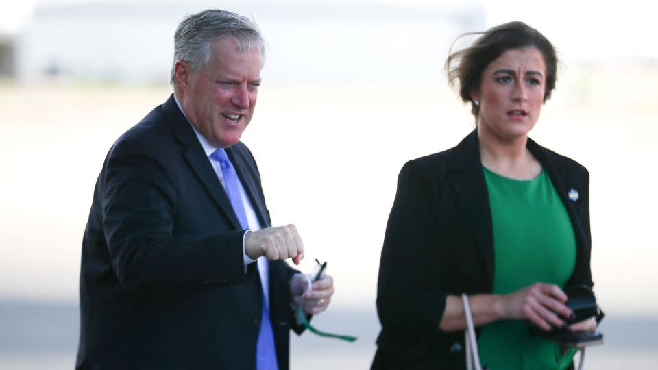 White House Chief of Staff Mark Meadows, left, walks with senior aide Cassidy Hutchinson before a campaign rally in North Carolina on October 22, 2020. - Tom Brenner/Reuters