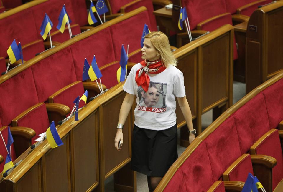 An opposition deputy, wearing a T-shirt in support of imprisoned former Ukrainian Prime Minister Yulia Tymoshenko, arrives at a session of Parliament in Kiev