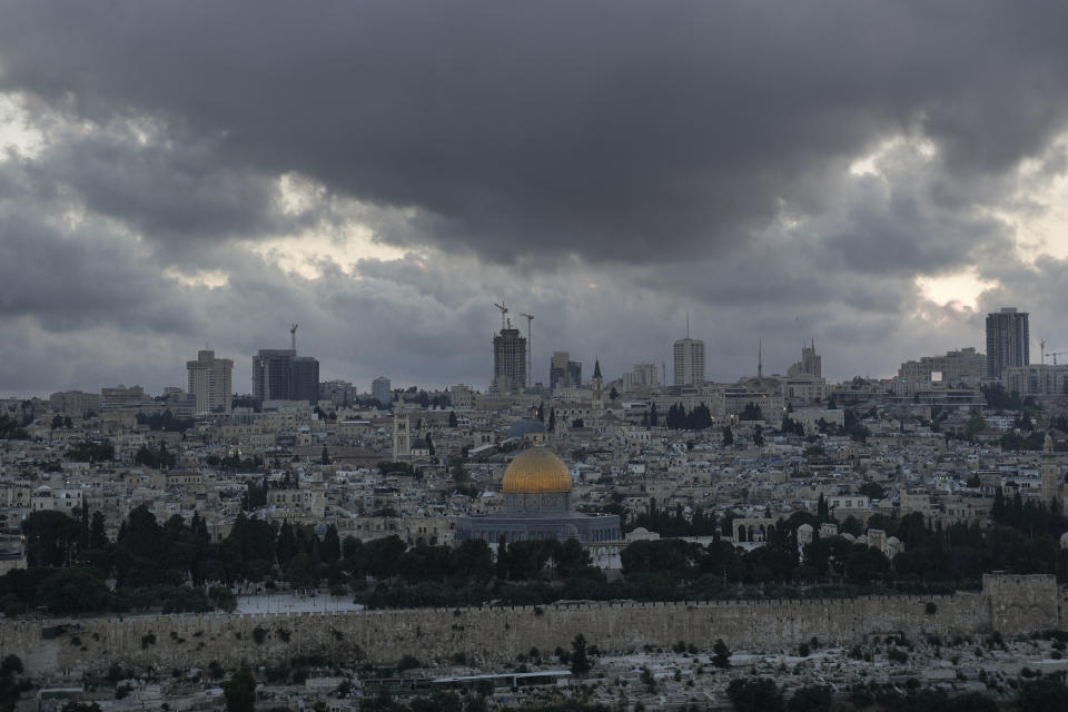 FILE - A view of the Jerusalem Old city with the Dome of the Rock shrine, center, at the Al Aqsa Mosque compound in Jerusalem's Old City Tuesday, June 21, 2022. When Israel struck an agreement to establish diplomatic ties with the United Arab Emirates in 2020, but two years after an expected windfall of Gulf Arab tourists to Israel has been little more than a trickle. (AP Photo/Mahmoud Illean, File)