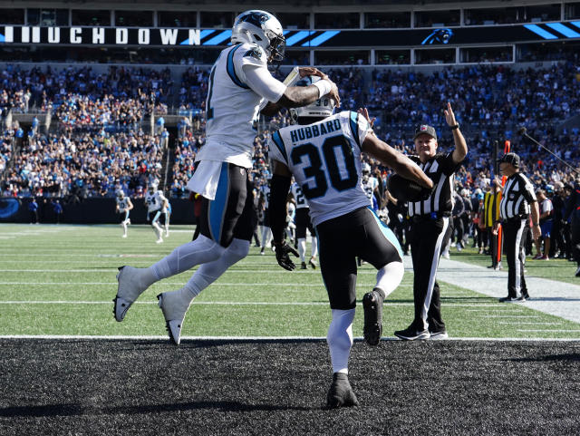 FILE - Carolina Panthers running back Christian McCaffrey (22) runs with  the ball against the Washington Football Team during an NFL football game  Sunday, Nov. 21, 2021, in Charlotte, N.C. The Panthers