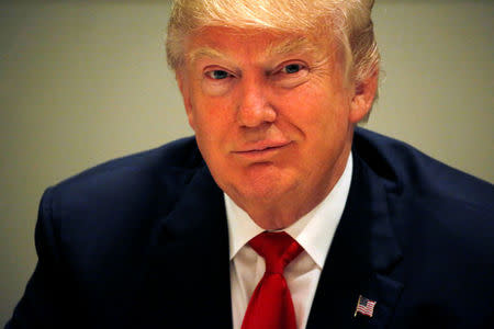 Republican U.S. presidential nominee Donald Trump meets with Cuban-American community leaders at Trump National Doral golf club in Miami, Florida, U.S. October 25, 2016. REUTERS/Jonathan Ernst