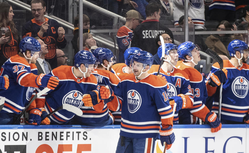 Edmonton Oilers' Zach Hyman (18) celebrates after a goal against the Los Angles Kings during first-period NHL hockey game action in Edmonton, Alberta, Monday, Feb. 26, 2024. (Jason Franson/The Canadian Press via AP)