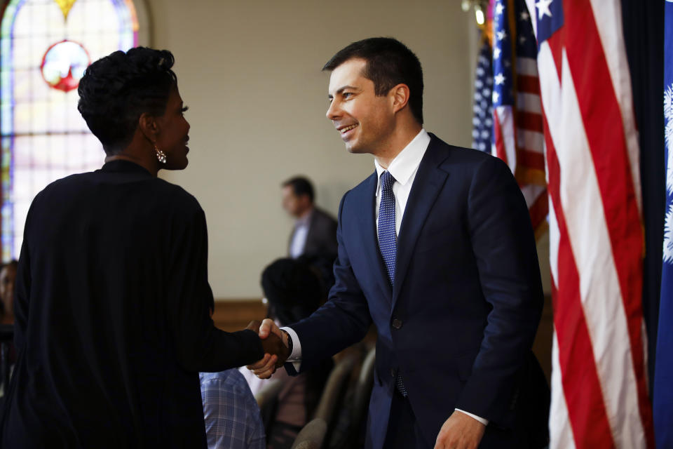 Democratic presidential candidate former South Bend, Ind., Mayor Pete Buttigieg, right, greets Stephania Priester at a roundtable discussing health equity, Thursday, Feb. 27, 2020, at the Nicholtown Missionary Baptist Church in Greenville, S.C. (AP Photo/Matt Rourke)