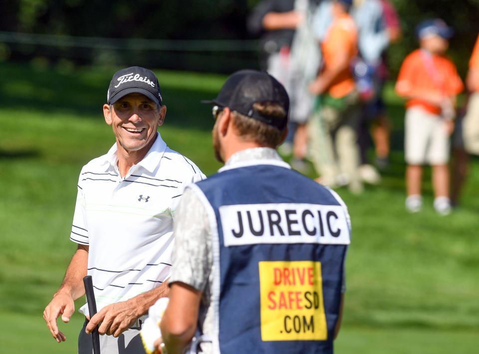 Jay Jurecic smiles at his brother and caddie, Jeff Jurecic, during the first day of the Sanford International golf tournament on Friday, September 17, 2021, at the Minnehaha Country Club in Sioux Falls. Erin Bormett / Argus Leader