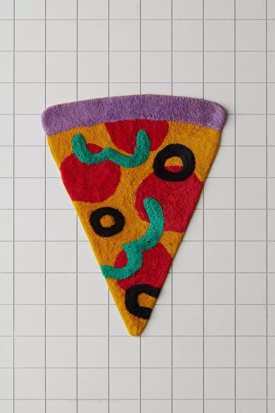 <p><a href="https://go.redirectingat.com?id=74968X1596630&url=https%3A%2F%2Fwww.urbanoutfitters.com%2Fshop%2Fpizza-bath-mat&sref=https%3A%2F%2Fwww.delish.com%2Ffood-news%2Fg3130%2Fpizza-themed-gifts%2F" rel="nofollow noopener" target="_blank" data-ylk="slk:Shop Now;elm:context_link;itc:0;sec:content-canvas" class="link ">Shop Now</a></p><p>Pizza Bath Mat</p><p>Urban Outfitters</p><p>$34.00</p>