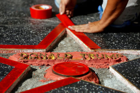 Donald Trump's star on the Hollywood Walk of Fame is fixed after it was vandalized. Los Angeles-based City News Service reported that a man identifying himself as James Lambert Otis said he damaged the installation "to make a point." REUTERS/Mario Anzuoni