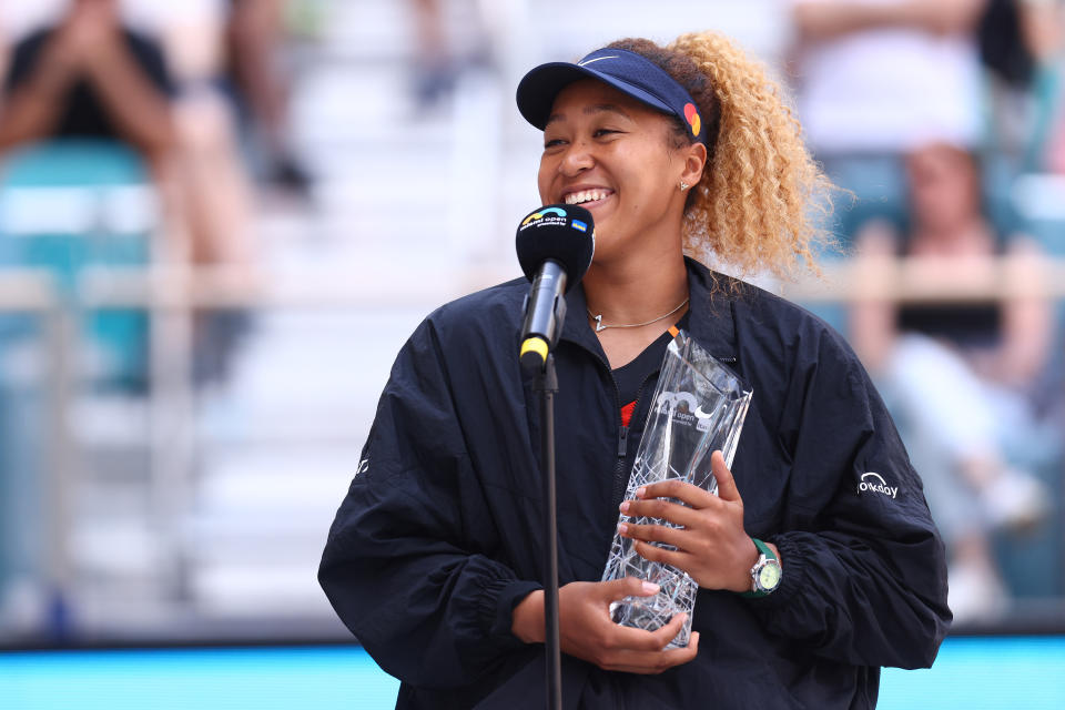 Naomi Osaka, pictured here speaking to the crowd after losing to Iga Swiatek in the Miami Open final.