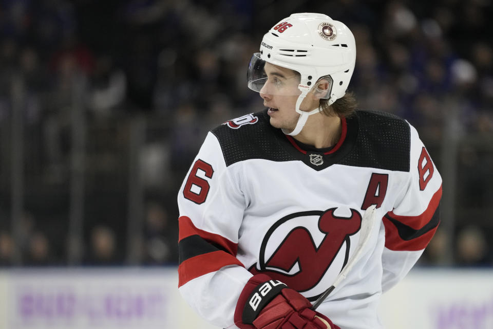 New Jersey Devils center Jack Hughes (86) reacts after scoring on New York Rangers goaltender Igor Shesterkin (31) in the second period of an NHL hockey game, Monday, Nov. 28, 2022, in New York. (AP Photo/John Minchillo)