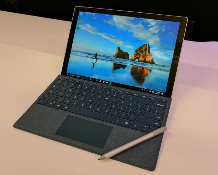 Microsoft Surface Pro with keyboard and pen accessories.