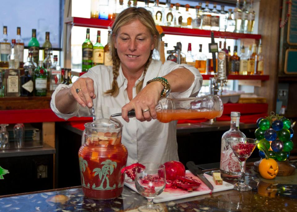 Marilyn Schlossbach, owner of Langosta Lounge, creates a Harvest Sangria at her Asbury Park Boardwalk restaurant in this 2013 photo